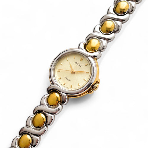 Rare 90s Two-Tone Seiko Tiss√© Quartz Watch with Round Dial and Thin Bracelet