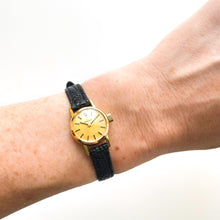 Load image into Gallery viewer, Tiny 1970s gold-plated Omega Ladies&#39; Vintage Mechanical Watch with Black Leather Strap
