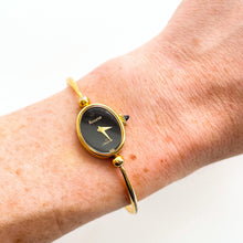 Load image into Gallery viewer, Vintage Gold-Plated Ladies&#39; Accurist Mechanical Watch with bangle Bracelet and Black Oval Dial
