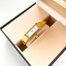 Load image into Gallery viewer, Vintage 1990s Ladies&#39; Gold-Plated Gucci 1500L Bangle Quartz Watch with Rectangular Mother of Pearl Dial - Boxed
