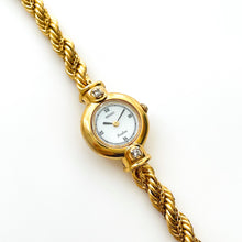 Load image into Gallery viewer, Very Rare 90s Gold-Plated Seiko Exceline Jewellery Quartz Watch with Tiny Mother of Pearl Dial, Thin Bracelet and Diamonds
