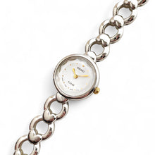 Load image into Gallery viewer, Rare 90s Silver-Tone Seiko Tissé Quartz Watch with Round Dial and Faceted Glass
