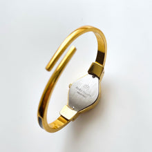 Load image into Gallery viewer, Vintage André Mouche Quartz Watch with Navy Enamel Floral Design, Concealead Dial and Gold-Plated Bangle Bracelet
