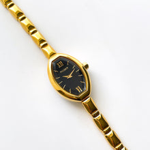 Load image into Gallery viewer, Thin Vintage Ladies&#39; Pulsar (Seiko) Gold-Tone Quartz Watch - Black Dial
