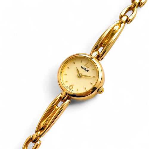 Thin Ladies' Lorus (by Seiko) Quartz Watch with Gold-Tone Bracelet and Round Dial