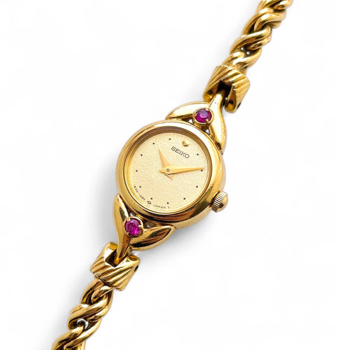 Very Rare 1990 Gold-Plated Seiko Jewellery Quartz Watch with Tiny Dial, Thin Twisted Bracelet and Two Rubies