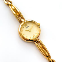 Load image into Gallery viewer, Thin Ladies&#39; Lorus (by Seiko) Quartz Watch with Gold-Tone Bracelet and Round Dial
