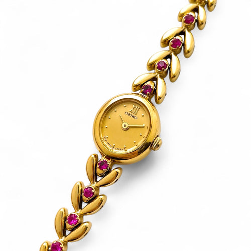 Very Rare 90s Gold-Plated Seiko Jewellery Quartz Watch with Tiny Oval Dial, Thin Bracelet and 8 Rubies