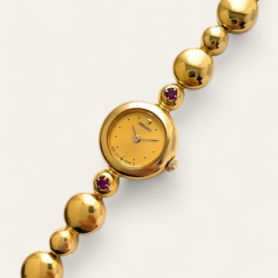 Rare 90s Gold-Plated Seiko Jewellery Quartz Watch with Tiny Dial, Thin Beaded Bracelet and Rubies