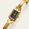 Givenchy Millésime – Gold-Plated Quartz Bangle Watch with Black Dial, 1990s
