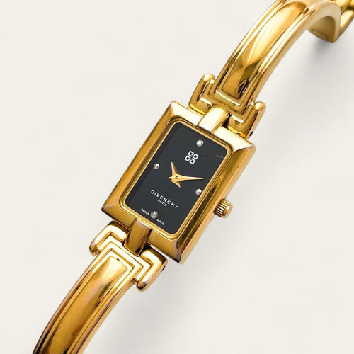 Givenchy Millésime – Gold-Plated Quartz Bangle Watch with Black Dial, 1990s
