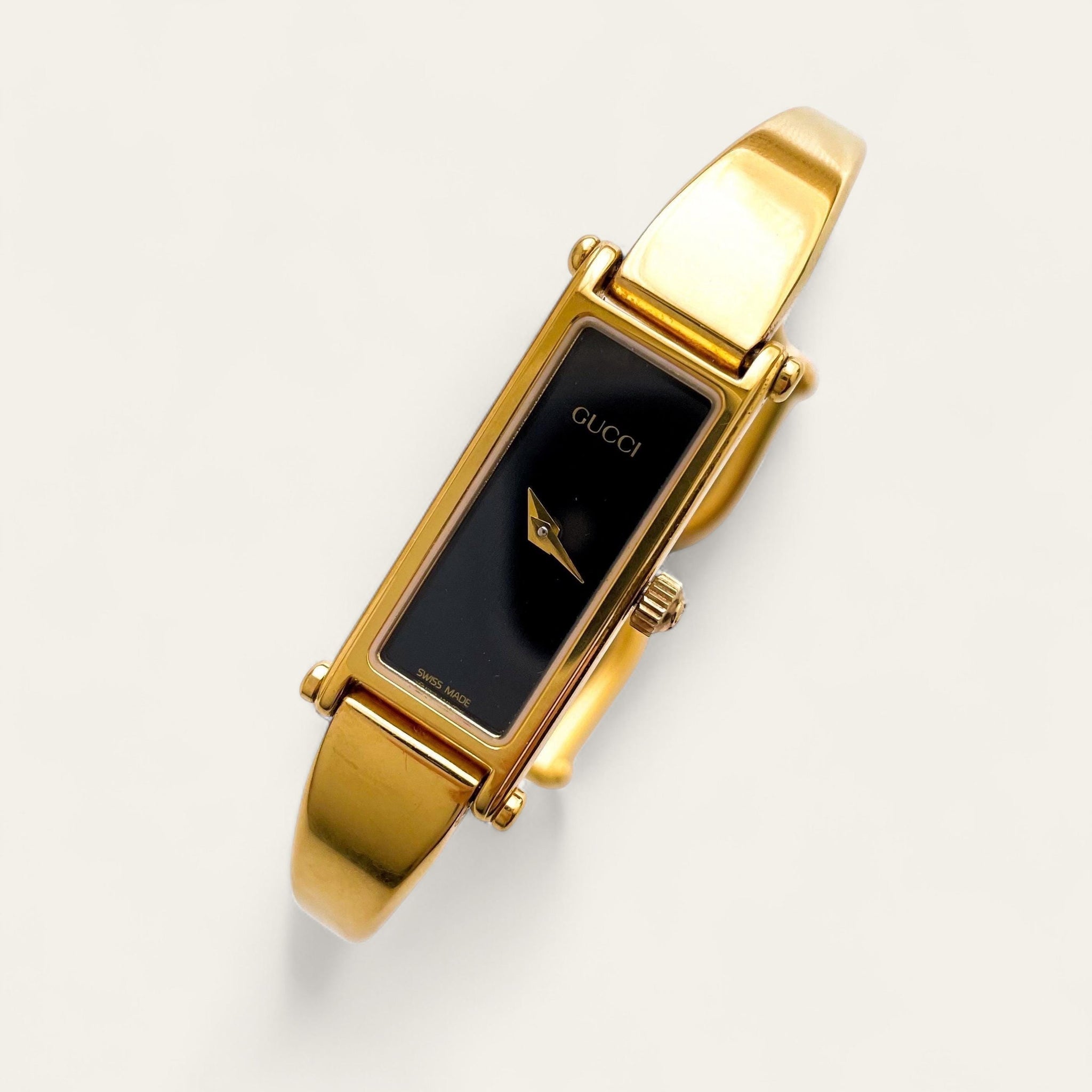 Vintage Gold-Plated Gucci 1500 Bangle Watch - Quartz, Black Dial