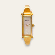 Load image into Gallery viewer, Vintage 1990s Ladies' Gold-Plated Gucci 1500L Bangle Quartz Watch - Mother of Pearl Dial
