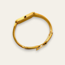 Load image into Gallery viewer, Vintage 1990s Ladies' Gold-Plated Gucci 1500L Bangle Quartz Watch - Mother of Pearl Dial

