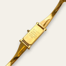 Load image into Gallery viewer, Vintage 1990s Ladies' Gold-Plated Gucci 1500L Bangle Quartz Watch - Mother of Pearl Dial
