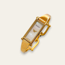 Load image into Gallery viewer, Vintage 1990s Ladies' Gold-Plated Gucci 1500L Bangle Quartz Watch - Mother of Pearl Dial
