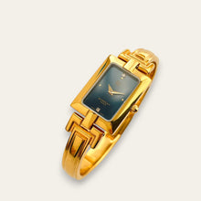 Load image into Gallery viewer, Vintage 1990s Gold-Plated Ladies' Givenchy Bangle Watch with Blue
