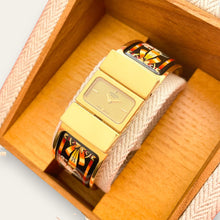 Load image into Gallery viewer, Vintage Hermès Loquet - 1990s Enamel Bangle Horse Motif Quartz Watch
