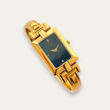 Load image into Gallery viewer, Vintage 1990s Gold-Plated Ladies' Givenchy Bangle Watch with Blue
