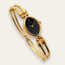 Load image into Gallery viewer, Vintage Pulsar by Seiko Ladies Bangle Quartz Watch | Gold-Tone Oval Dial
