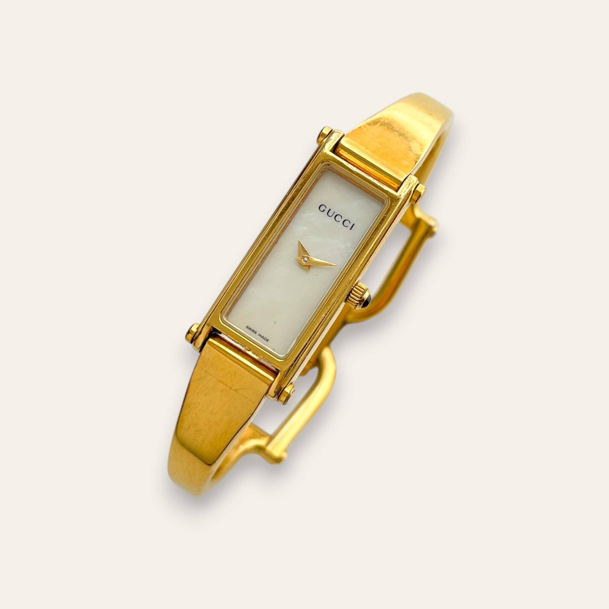 Vintage Gucci 1500L Gold Bangle Watch with Mother of Pearl Dial