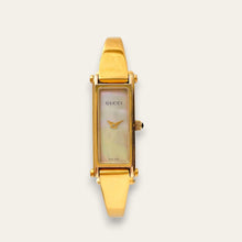 Load image into Gallery viewer, Vintage Gucci 1500L Gold Bangle Watch with Mother of Pearl Dial, 90s Quartz
