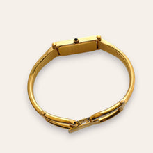 Load image into Gallery viewer, Vintage Gucci 1500L Gold Bangle Watch with Mother of Pearl Dial, 90s Quartz
