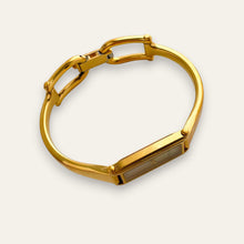 Load image into Gallery viewer, Vintage Gucci 1500L Gold Bangle Watch with Mother of Pearl Dial, 90s Quartz
