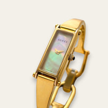 Load image into Gallery viewer, Vintage Gucci 1500L Gold Bangle Watch with Mother of Pearl Dial, 90s Quartz
