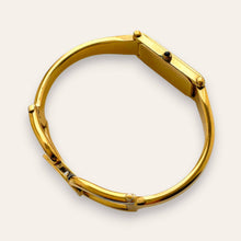 Load image into Gallery viewer, Vintage Gucci 1500L Gold Bangle Watch with Mother of Pearl Dial, 90s Quartz
