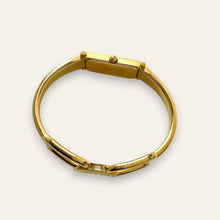 Load image into Gallery viewer, Vintage Gucci 1500 Gold Bangle Watch with Mother of Pearl Dial, 90s Quartz
