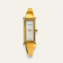 Load image into Gallery viewer, Vintage Gucci 1500L Gold Bangle Watch with Mother of Pearl Dial, 90s Quartz
