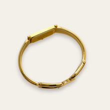 Load image into Gallery viewer, Vintage Gucci 1500 Gold Bangle Watch with Mother of Pearl Dial, 90s Quartz
