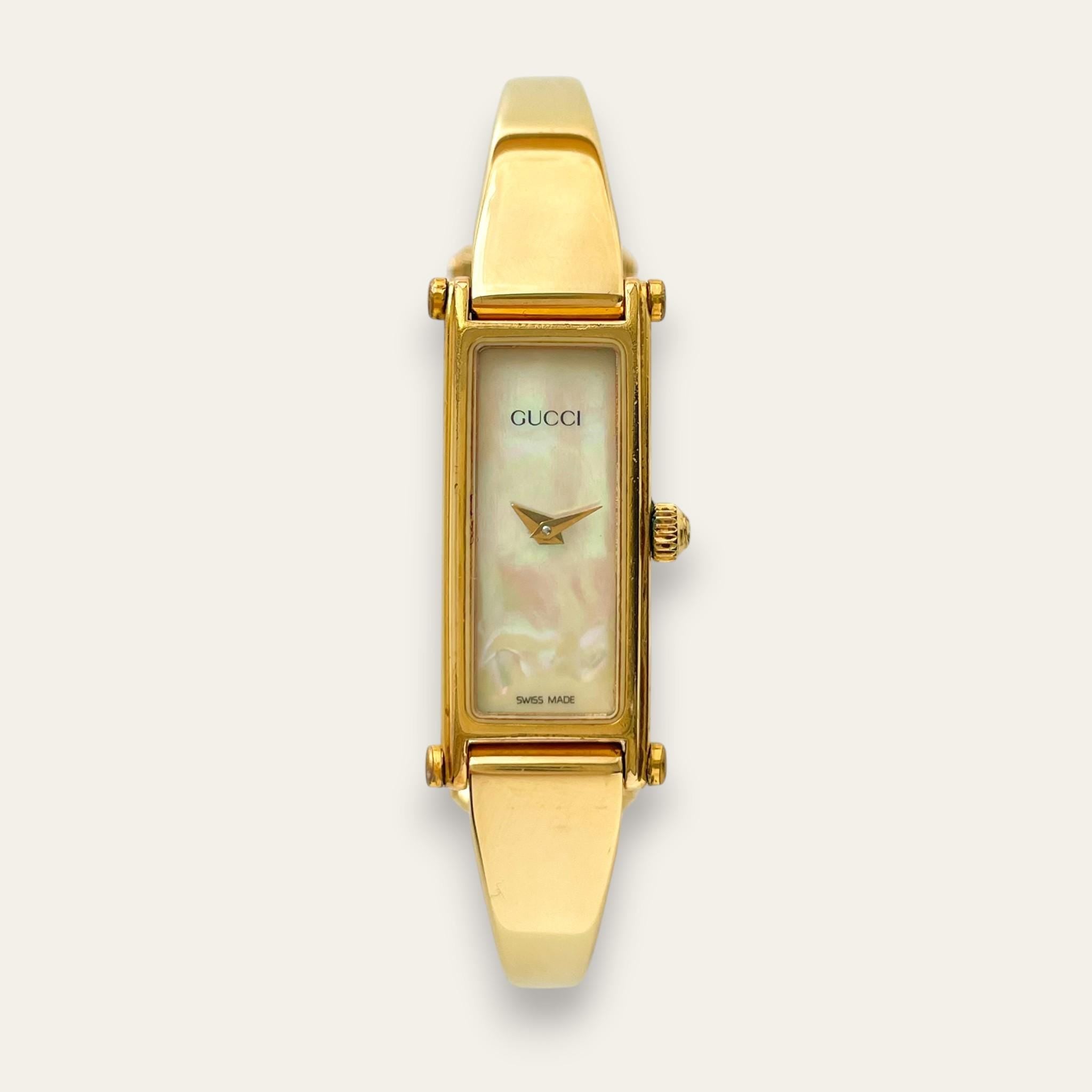 Vintage Gucci 1500 Gold Bangle Watch with Mother of Pearl Dial