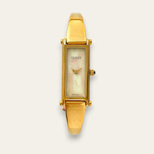 Load image into Gallery viewer, Vintage Gucci 1500L Gold Bangle Watch with Mother of Pearl Dial, 90s Quartz
