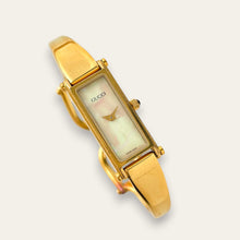 Load image into Gallery viewer, Vintage Gucci 1500L Gold Bangle Watch with Mother of Pearl Dial, 90s Quartz
