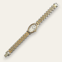Load image into Gallery viewer, Vintage Seiko Two-Tone Oval Quartz Watch Blued Hands Roman Numerals
