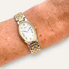 Load image into Gallery viewer, Vintage Seiko Two-Tone Oval Quartz Watch Blued Hands Roman Numerals
