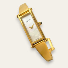 Load image into Gallery viewer, Vintage Gucci 1500L Gold Bangle Watch with Mother of Pearl Dial, 90s Quartz
