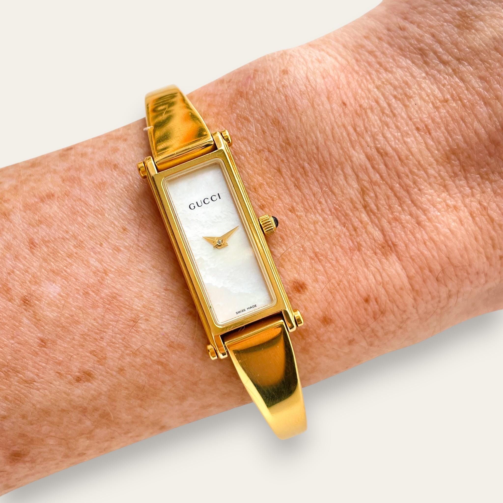 Vintage Gucci 1500L Gold Bangle Watch with Mother of Pearl Dial