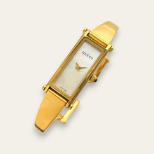 Load image into Gallery viewer, Vintage Gucci 1500L Gold Bangle Watch with Mother of Pearl Dial, 90s Quartz
