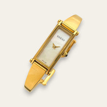 Load image into Gallery viewer, Vintage Gucci 1500L Gold Bangle Watch with Mother of Pearl Dial, 90s Quartz
