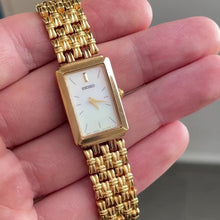 Load and play video in Gallery viewer, Vintage Seiko Ladies Watch Mother of Pearl Quartz Gold Tone Bracelet
