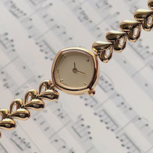Load and play video in Gallery viewer, Gold Tone Heart Link Bracelet Quartz Watch Retro Style
