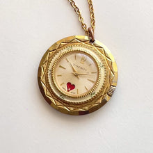 Load and play video in Gallery viewer, Vintage Timeroy Gold-Tone Swiss Mechanical Pendant Watch, Heart Detail
