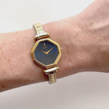 Load and play video in Gallery viewer, Vintage 1980 Gold-Plated Ladies&#39; Seiko Quartz Watch With Dark Blue Dial and Expanding Bracelet
