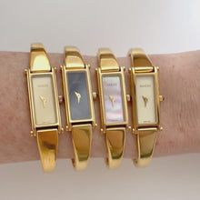 Load and play video in Gallery viewer, Vintage Ladies&#39; GP Gucci 1500L Bangle Quartz Watch - Gold Dial
