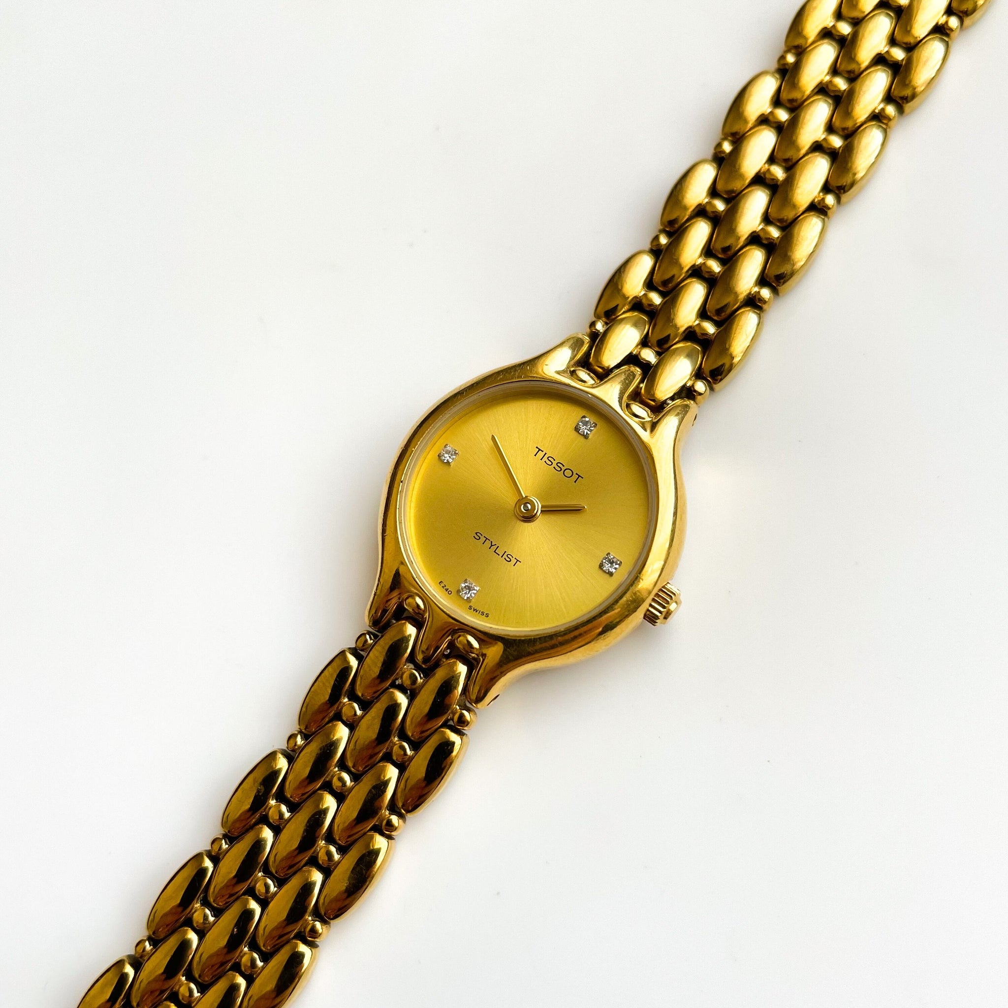 Tissot stylist ladies watch gold clearance