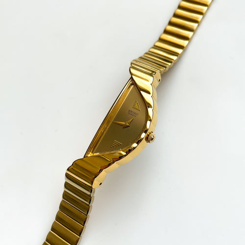 Thin Gold-Tone 1990 Ladies' Seiko Quartz Watch with Asymmetrical Dial